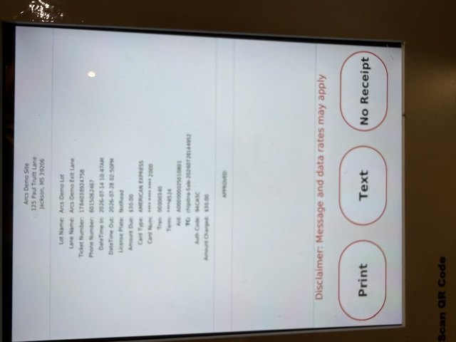 Parking kiosk exit screen showing the paid receipt with Print, Text and No Receipt buttons